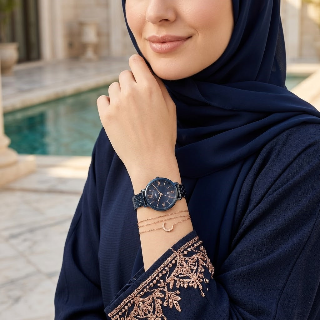 Lifestyle photo of Fossil ES4094 showing the watch on a woman's wrist with navy blue bracelet