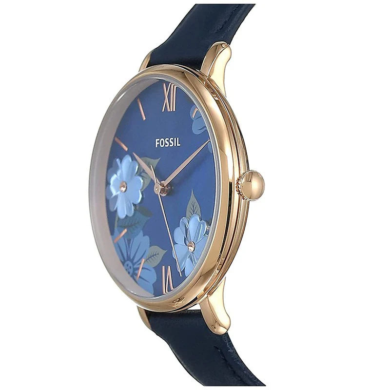 Angled real-life photo of Fossil Carlie Mini ES4673 showing the slim rose gold case and leather texture