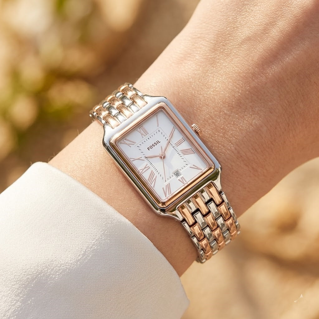 Close up shot of Fossil Raquel ES5222 on wrist showing rectangular two-tone case and roman numerals