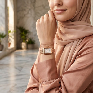 Lifestyle photo of Fossil Raquel ES5271 showing the watch on a woman's wrist with rose gold bracelet