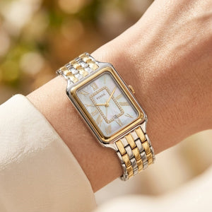 Close up shot of Fossil Raquel ES5305 on wrist showing rectangular two-tone case and crystal inner frame