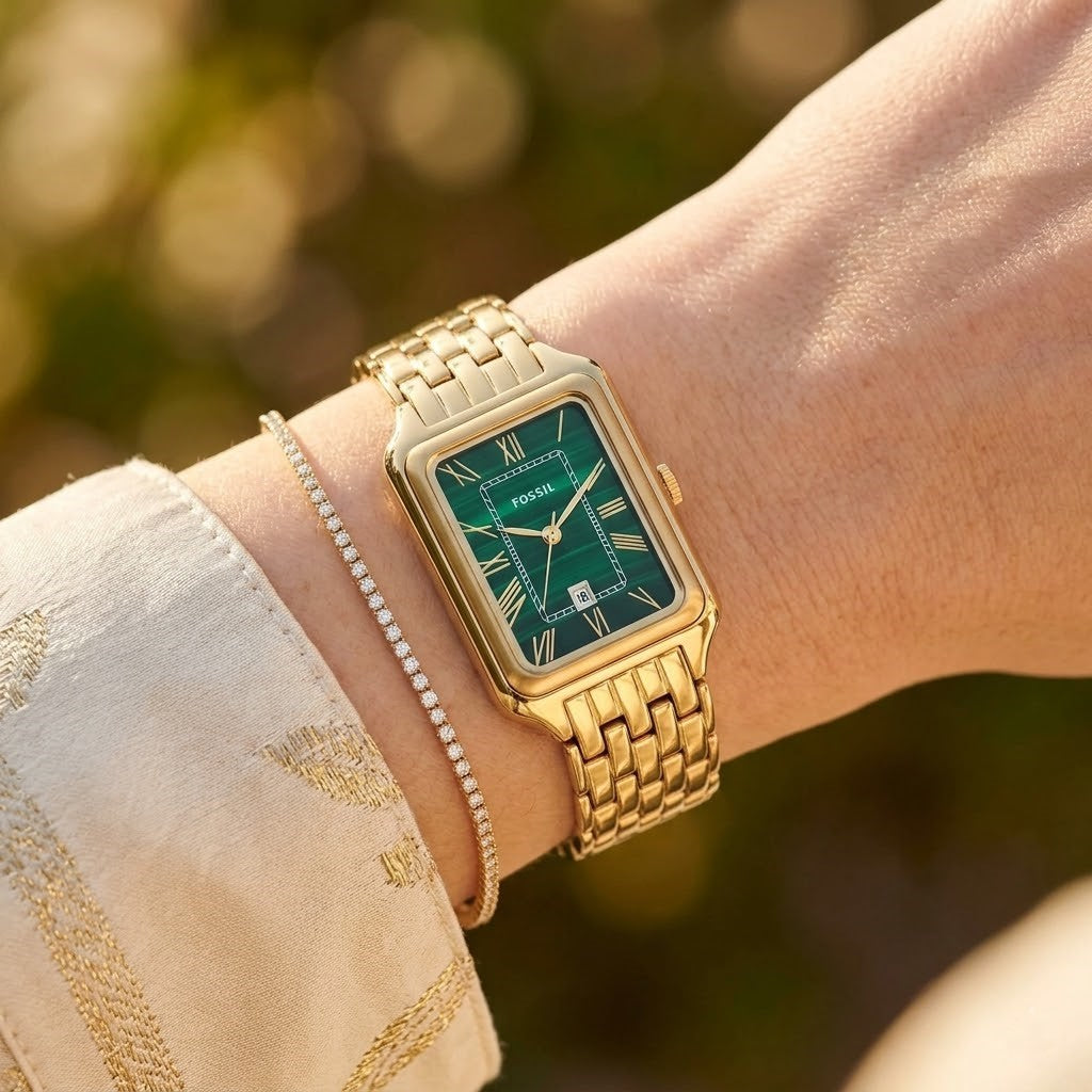 Close up shot of Fossil Raquel ES5341 on wrist showing rectangular case and green dial details