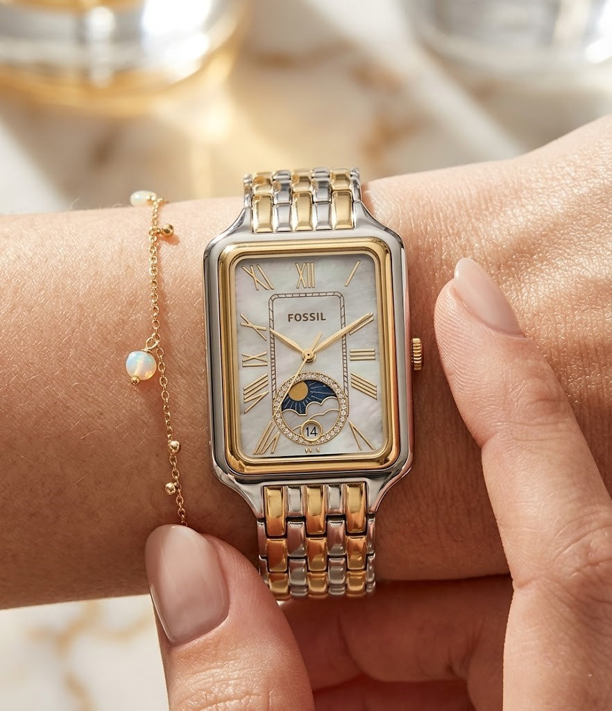 Lifestyle photo of Fossil Raquel ES5399 showing the rectangular two-tone watch on a woman's wrist