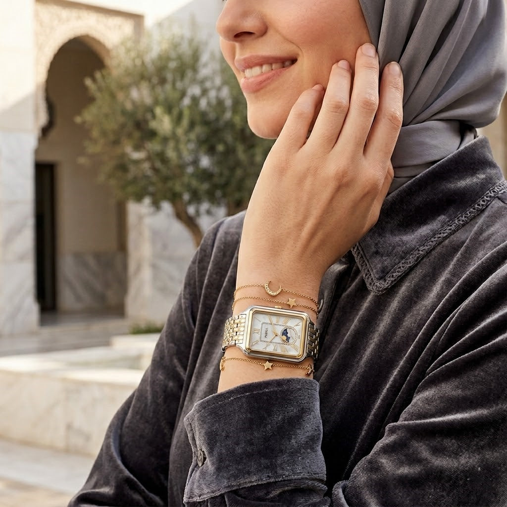 Lifestyle photo of Fossil Raquel ES5399 showing the rectangular two-tone watch on a woman's wrist
