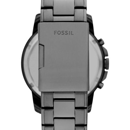 Fossil analog watch with a dark gray metallic link bracelet and a matching dark gray round case, shown from the back on a white background.