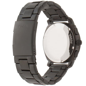 Fossil smartwatch with a dark gray metallic link band, shown from the back to display the case back and crown.