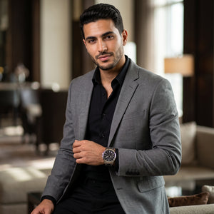 Luxury lifestyle image featuring the Fossil Grant FS4736 chronograph watch.