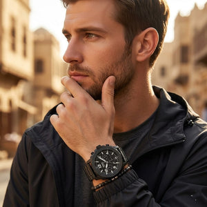 Lifestyle photo of Fossil FS4927 showing the watch on a man's wrist with solid black steel bracelet