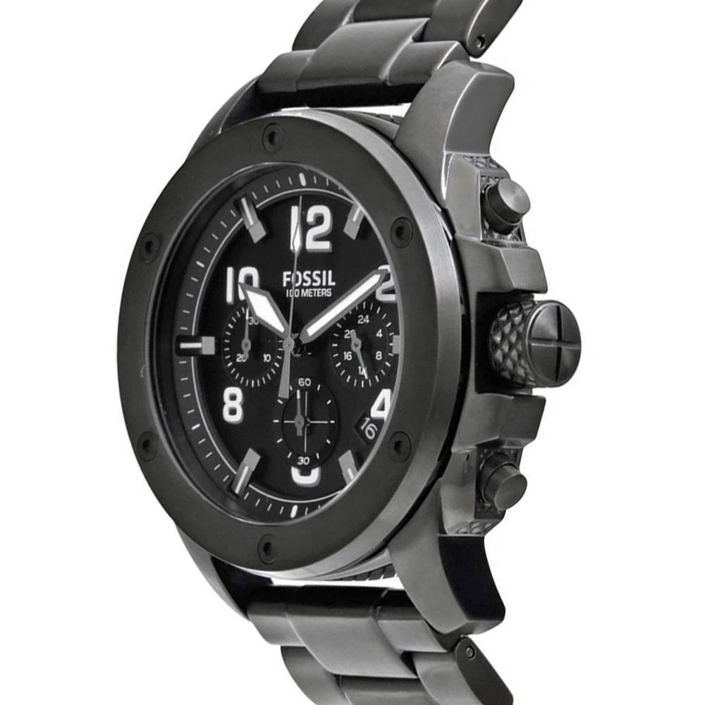 Perspective photo of Fossil FS4927 showing the side profile, knurled bezel, and buttons
