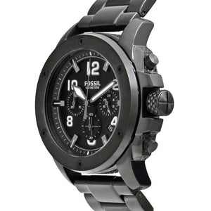 Perspective photo of Fossil FS4927 showing the side profile, knurled bezel, and buttons