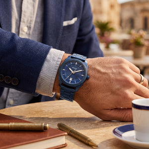 Live wrist shot of Fossil Machine FS5231 men's blue stainless steel watch.