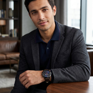 Luxury lifestyle image featuring the Fossil Townsman FS5378 chronograph watch.