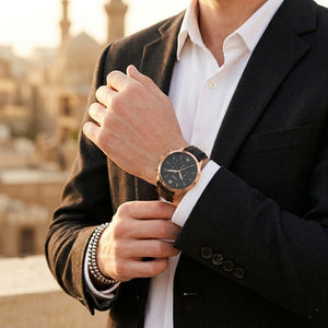 Lifestyle photo of Fossil FS5381 showing the watch on a man's wrist with black leather strap