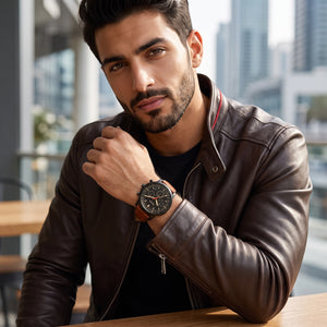 Luxury lifestyle image featuring the Fossil Goodwin FS5501 chronograph watch.