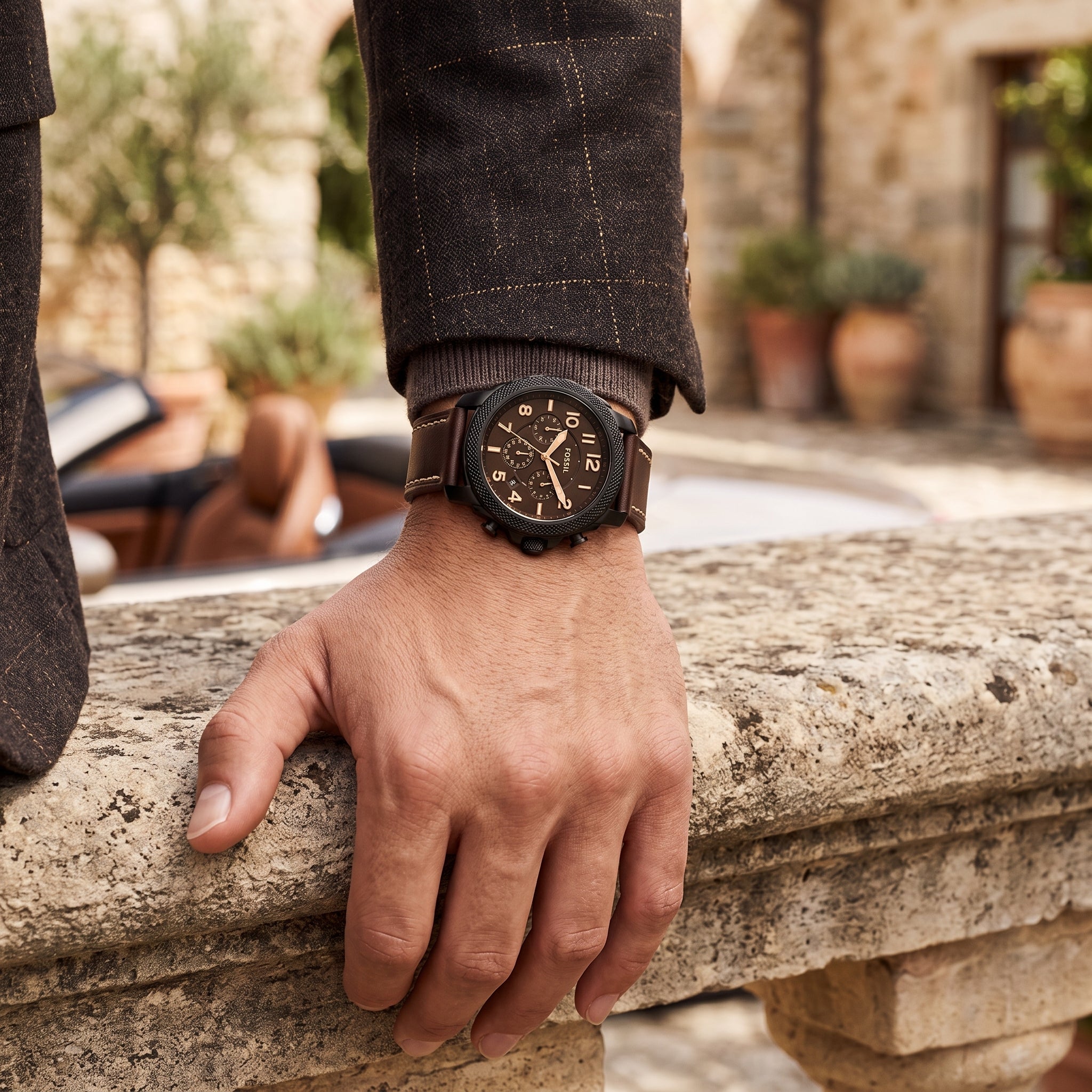 Fossil Machine FS5601 men's chronograph watch worn on the wrist.