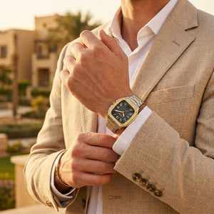 Lifestyle photo of Fossil FS6123 showing the bold two-tone square watch on a man's wrist