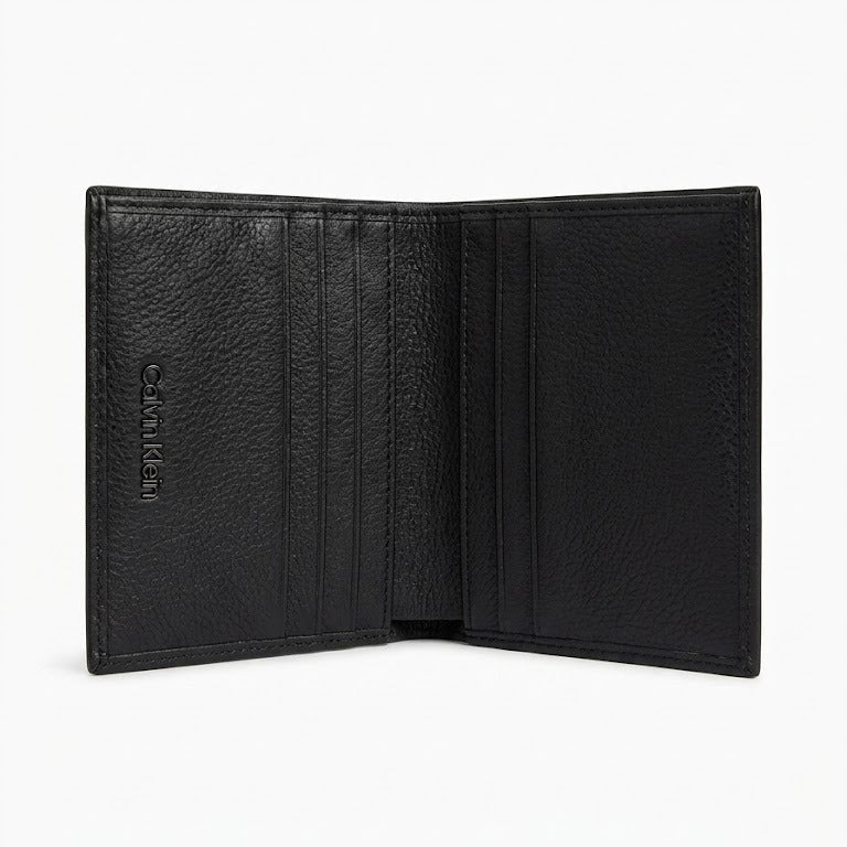Black leather wallet with visible brand logo on a white background