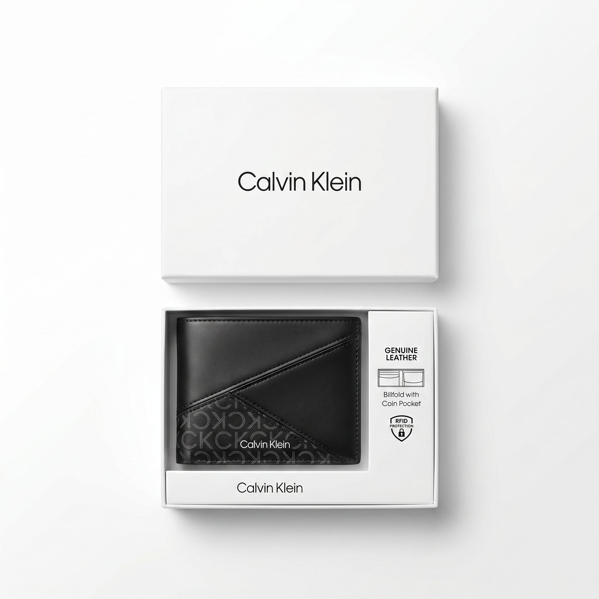Top-down studio photograph of the Calvin Klein smooth leather bifold wallet neatly placed inside its open premium black gift box