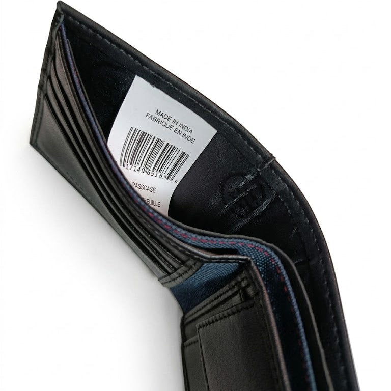 Close-up inside view of the Calvin Klein wallet showing the currency compartment, barcode tag, and premium branded lining
