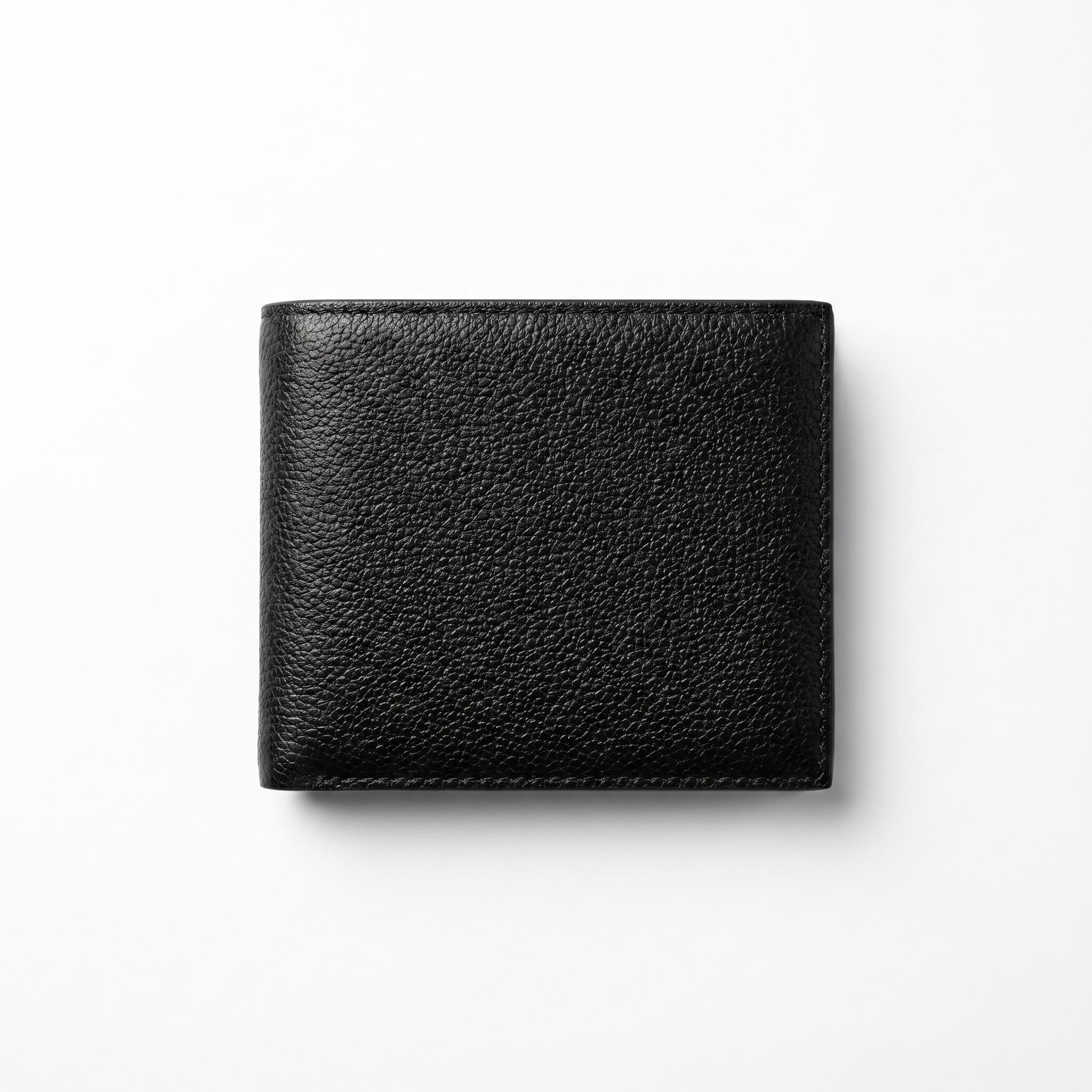 Full back panel product photography of the Calvin Klein pebbled black genuine leather wallet displaying clean stitched edges