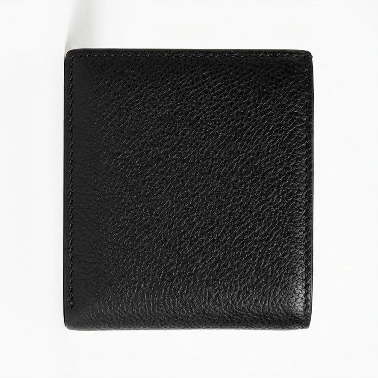 Back panel view of the Calvin Klein genuine saffiano leather wallet displaying clean stiching edges and textured design