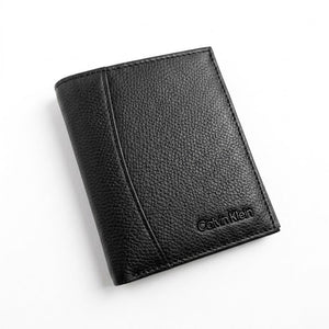 Premium Calvin Klein mirror original saffiano black leather wallet showcased inside its white gift box alongside the shopping bag