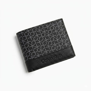 Full premium presentation of the Calvin Klein mirror original smooth black leather trifold wallet set with its white gift box and shopping bag