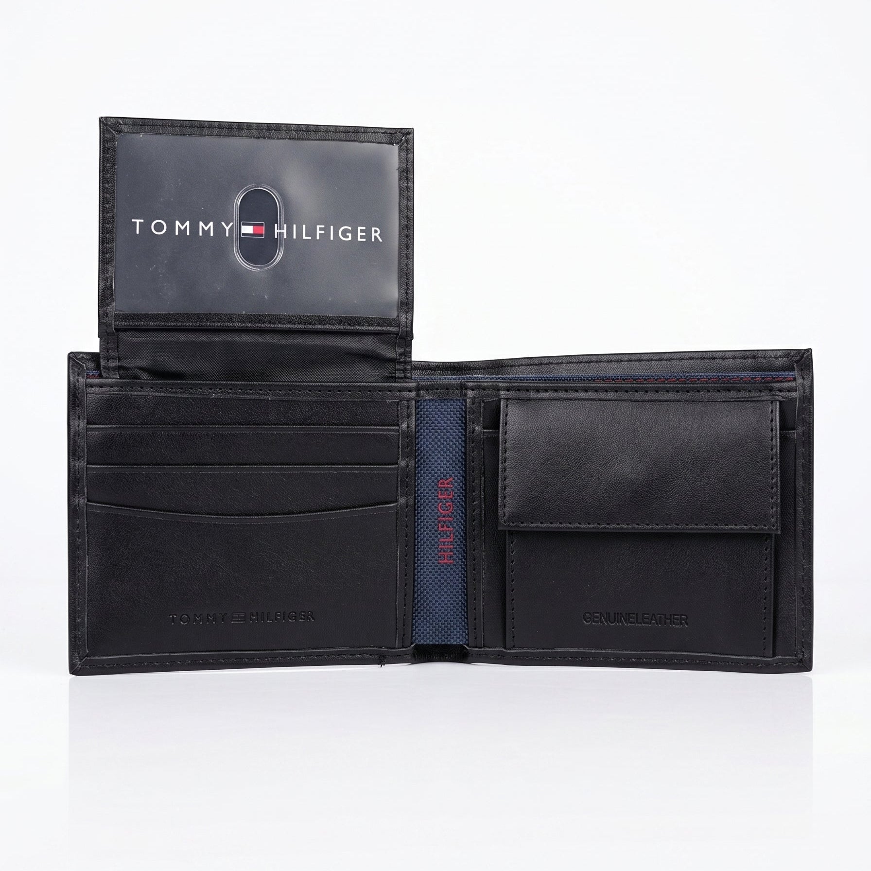 Interior view of the Tommy Hilfiger leather wallet showcasing card slots, a clear flip-up ID window, and a snap button coin pocket