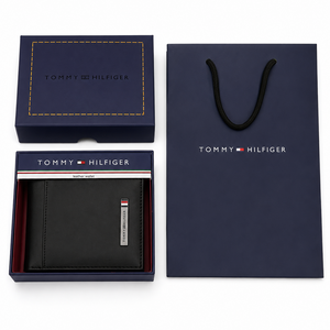 Full premium presentation of the Tommy Hilfiger mirror original smooth black leather wallet set with navy gift box and matching shopping bag