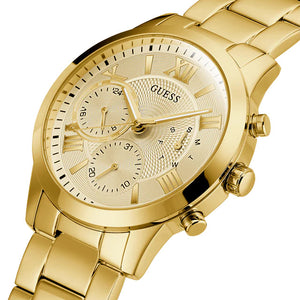 Right angle view of Guess Atlas W0668G4 showing the gold bezel