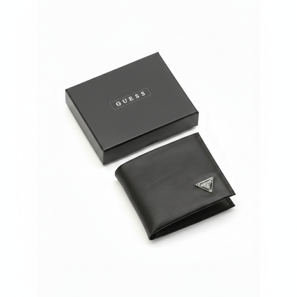 Angled view of a Guess men's black smooth leather wallet featuring a silver metal triangle logo, securely displayed inside its original open black gift box
