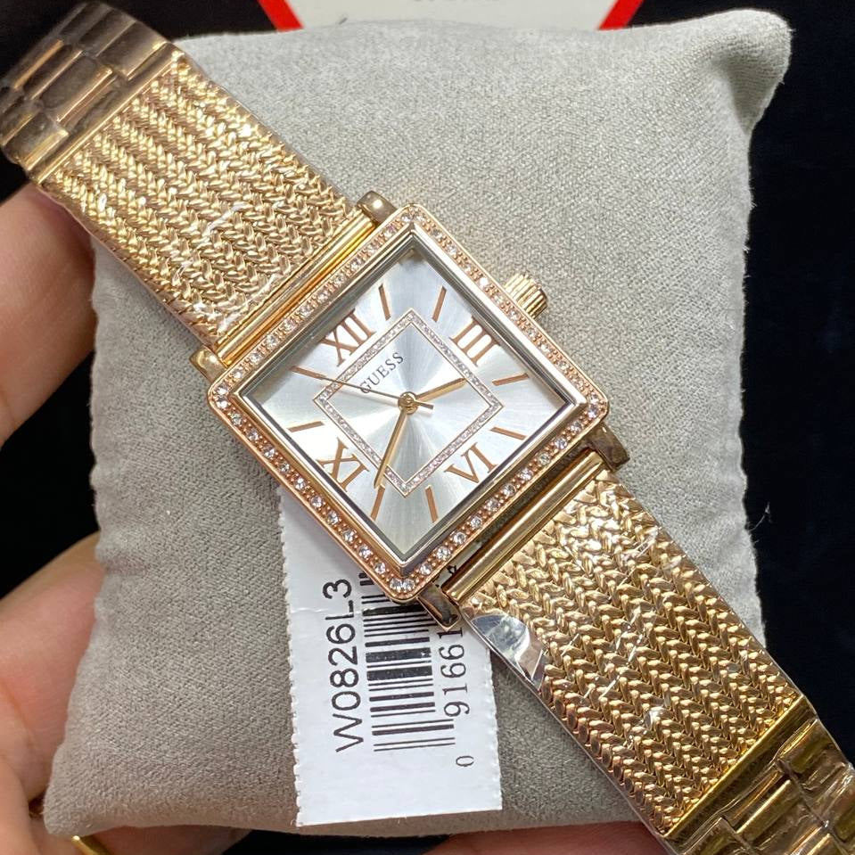 Authentic real-life photo of the Guess Chelsea W0826L3 watch showing actual rose gold finish and crystals