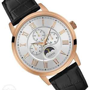 Angled view of the Guess W0870G2 highlighting the polished rose gold finish and 44mm case