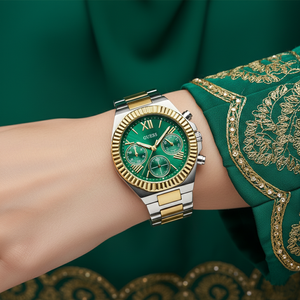Female model wearing Guess Equality GW0769L4 two-tone green watch with an elegant dress