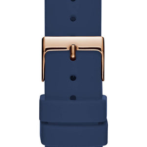 Rose gold tone stainless steel buckle clasp with Guess logo on the blue silicone strap of the W0911L6