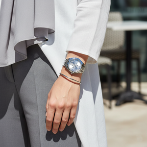 Woman wearing Guess G-Twist W1082L1 silver watch with a casual denim outfit