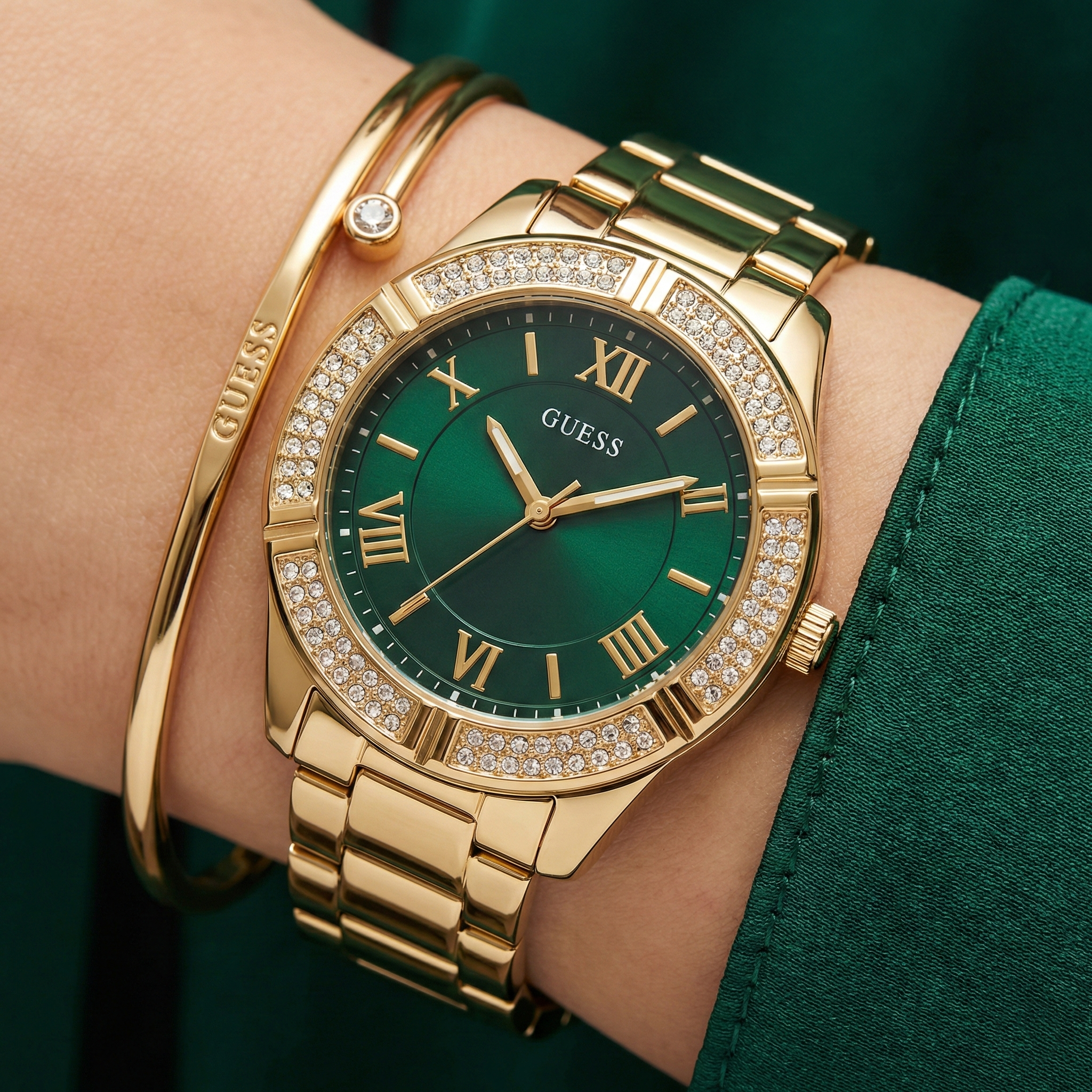 Close-up of Guess Cosmo GW0033L8 showing the green dial and crystal bezel