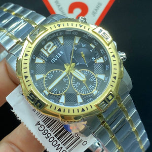 Authentic real-life photo of the Guess GW0056G4 showing actual two-tone shine and black dial depth in Egypt