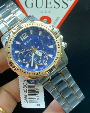 Authentic real-life photo of the Guess GW0056G5 showing actual two-tone shine and blue dial depth in Egypt