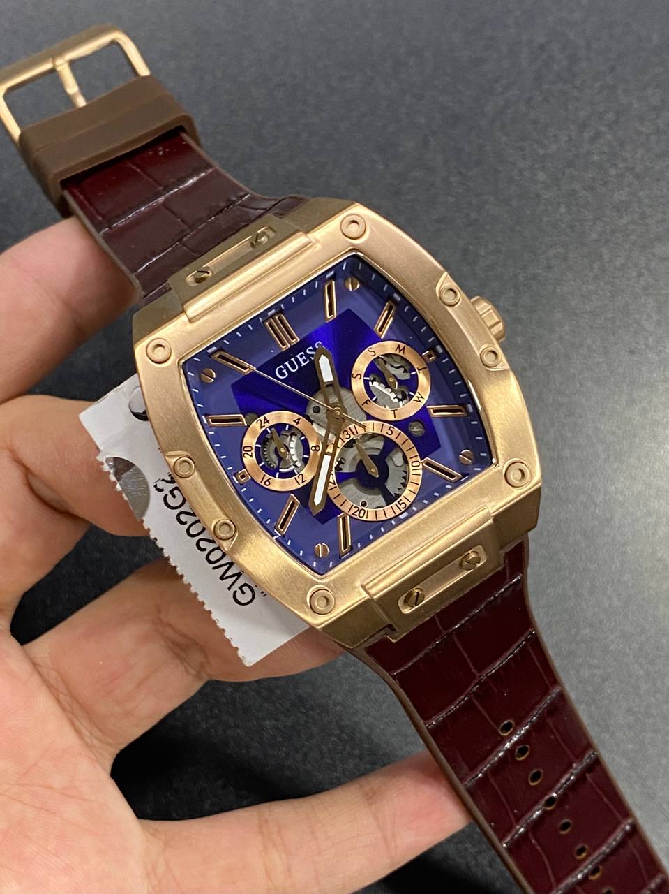 Real-life photo of Guess Phoenix GW0202G2 watch showing actual rose gold shine