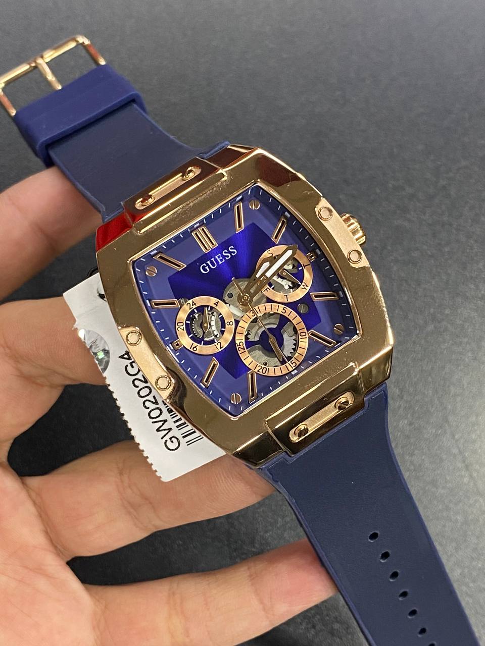 Real-life photo of Guess Phoenix GW0202G4 watch showing actual rose gold shine
