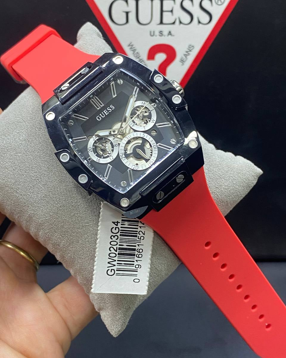 Authentic real-life photo of the Guess GW0203G4 showing actual black finish and red rubber strap in Egypt