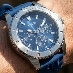 Close up shot of Guess GW0211G1 on wrist highlighting the blue textured dial and silver numbers