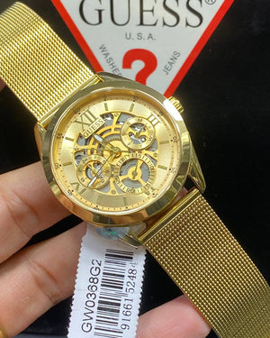 Authentic real-life photo of the Guess GW0368G2 showing actual gold mesh shine and skeleton details in Egypt