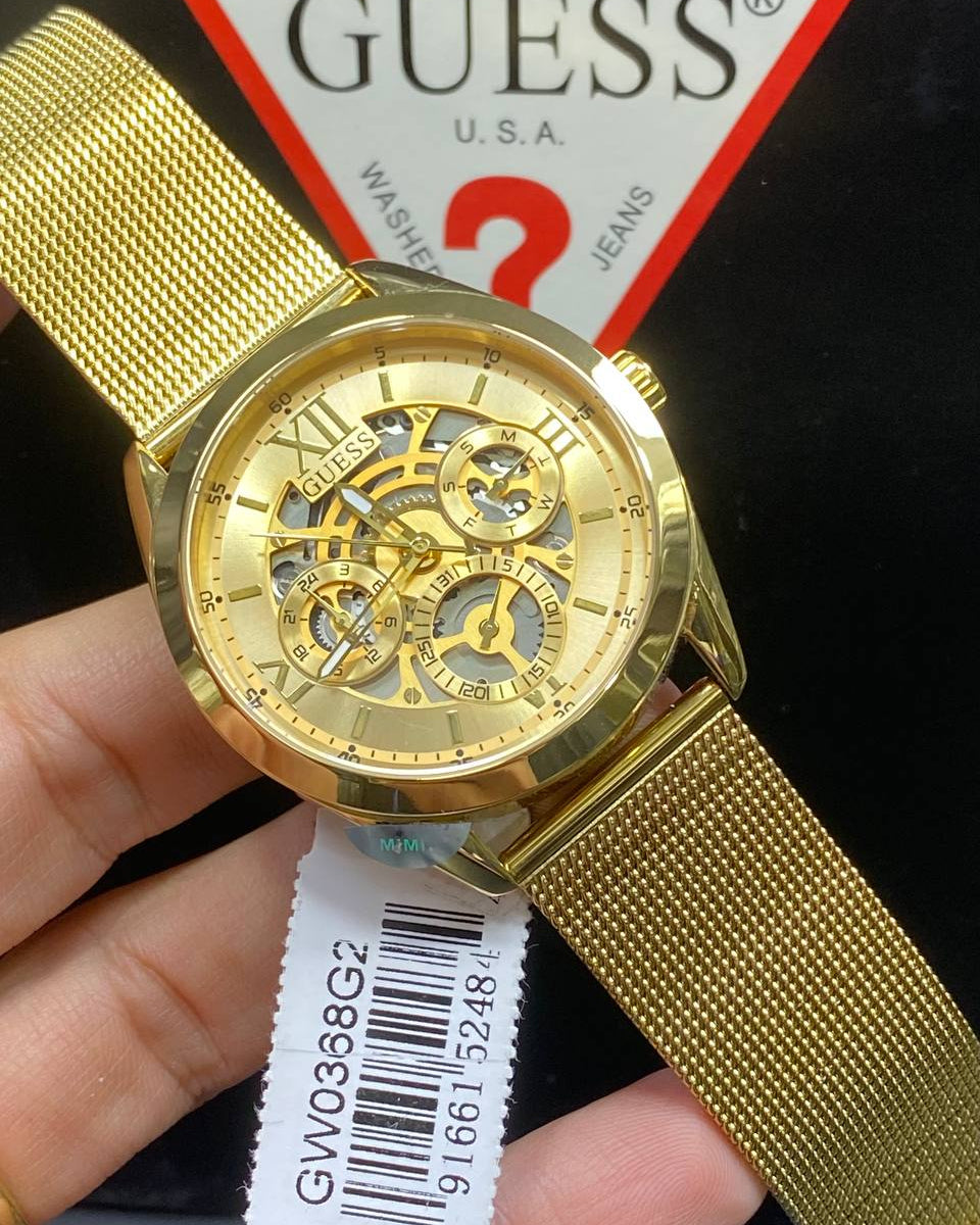 Authentic real-life photo of the Guess GW0368G2 showing actual gold mesh shine and skeleton details in Egypt
