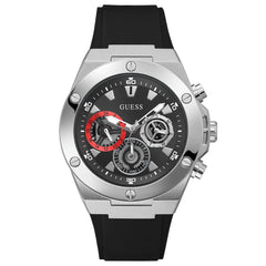 A Guess men's chronograph watch featuring a silver stainless steel case, a black dial with three sub-dials (including one with a red accent), and a black silicone strap, shown against a plain white background.