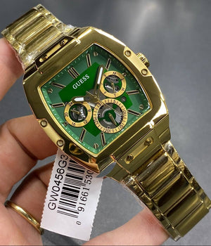 Real-life image of Guess GW0456G3 showing the actual green dial contrast and gold shine