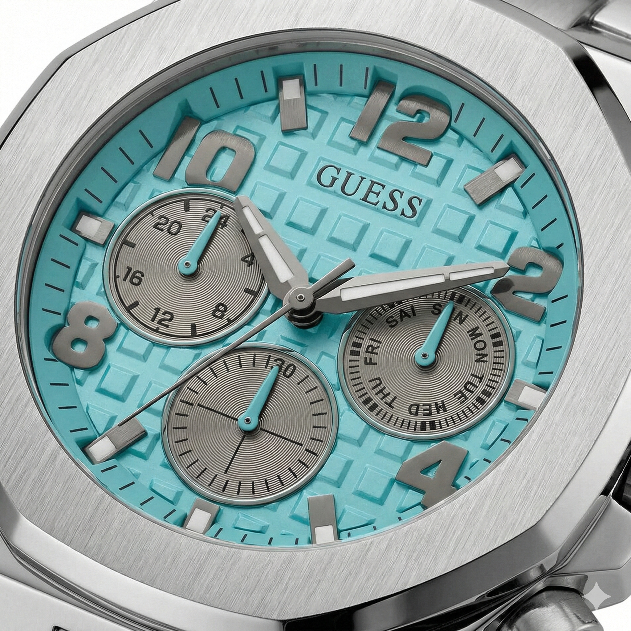 Close up shot of Guess GW0489G3 on wrist highlighting the turquoise textured dial and silver hands