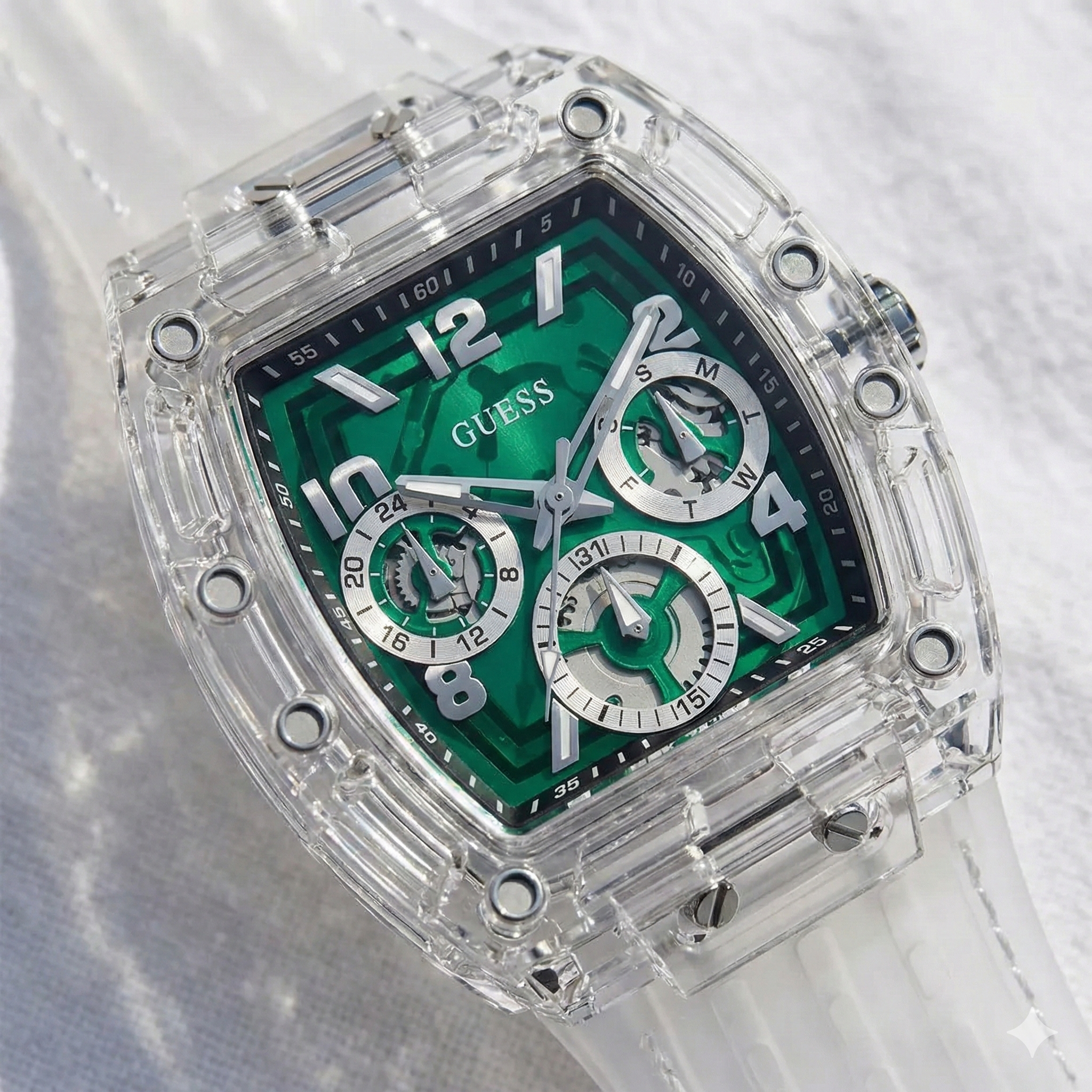 Detailed close-up of the green skeleton multifunction dial on Guess GW0499G8