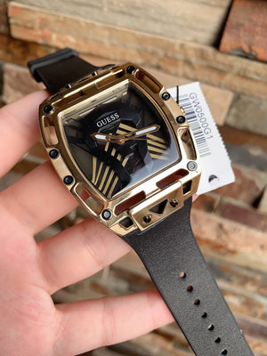 Real-life image of Guess GW0500G1 showing the gold shine and dial texture